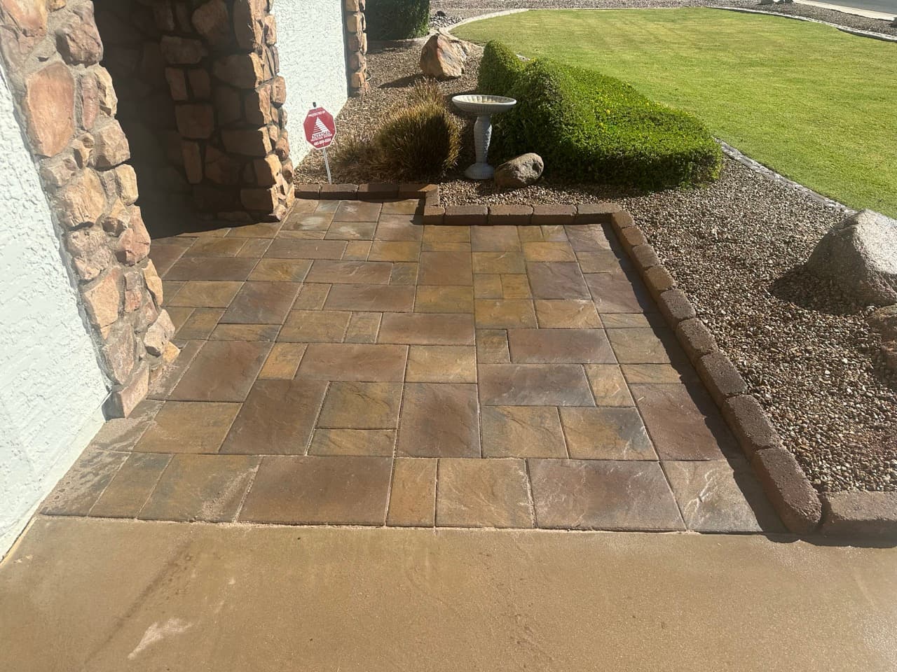 Travertine paver entryway with stone columns in Mesa, AZ