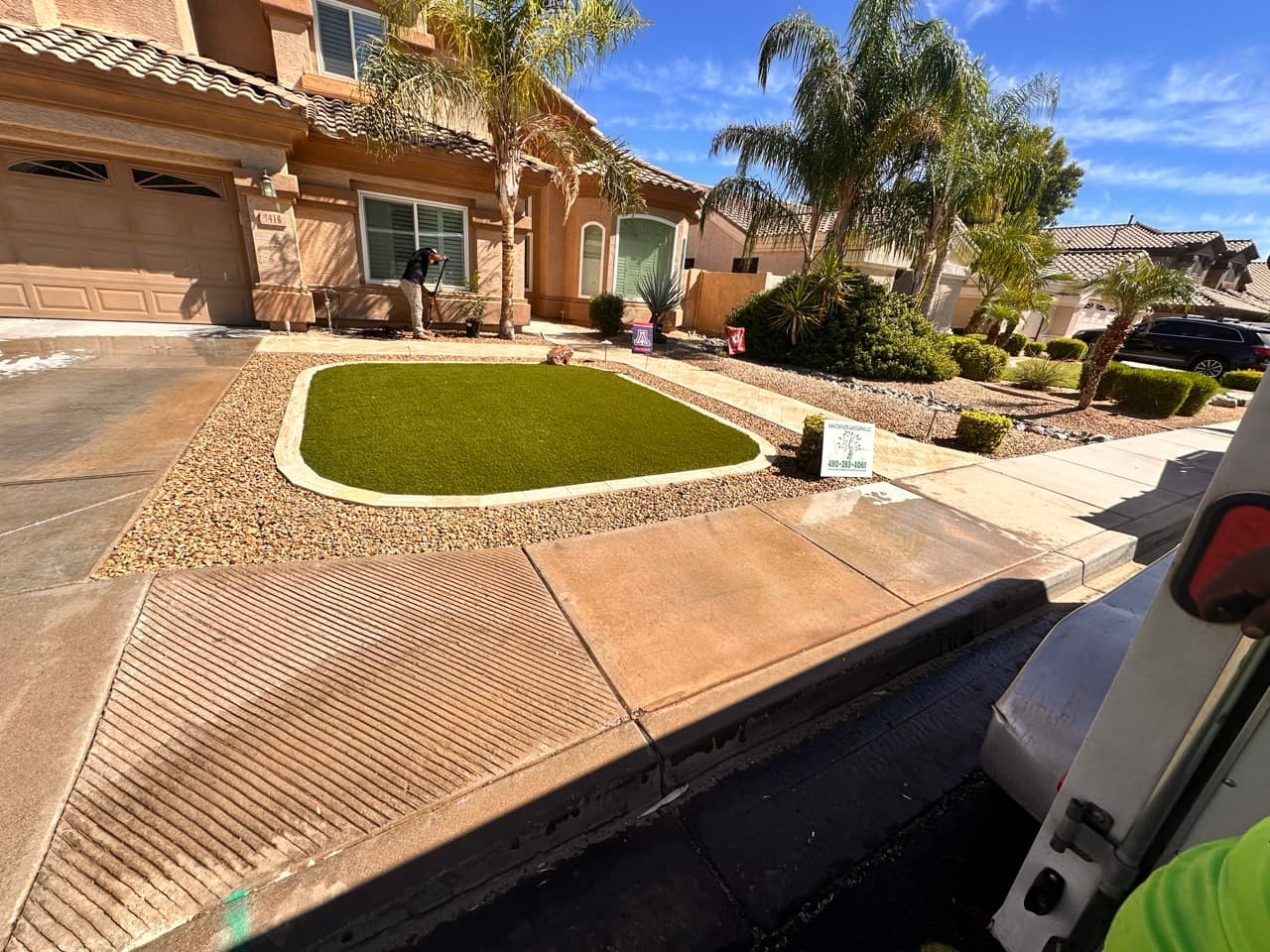 Completed front yard landscape design with artificial turf in Mesa, AZ